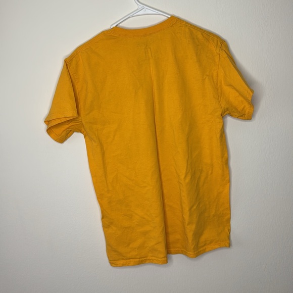 Size Medium. Spensers yellow/gold graphic tee - Picture 2 of 3